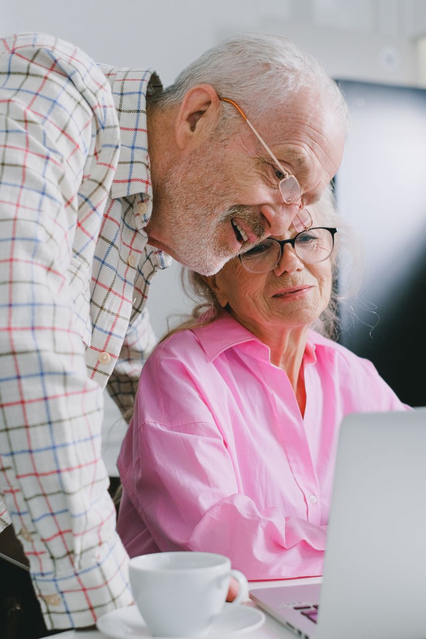 pexels-photo-7545349 elderly couple looking at laptop